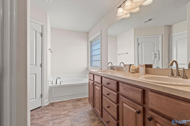 5008 Montauk Trl, Owens Cross Roads, AL 35763 - full bath with double vanity, a bath, and tile patterned flooring