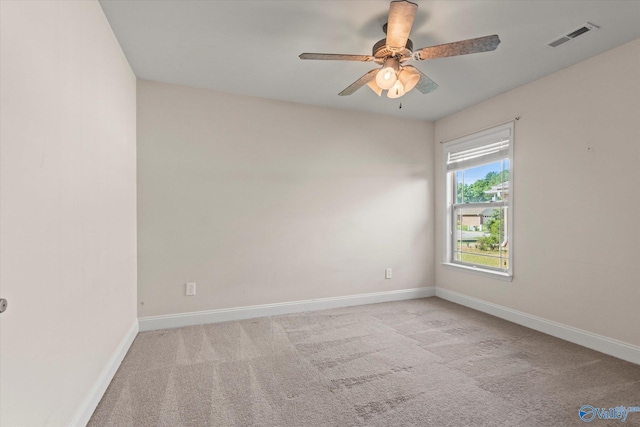 5008 Montauk Trl, Owens Cross Roads, AL 35763 - empty room featuring carpet floors, baseboards, and ceiling fan