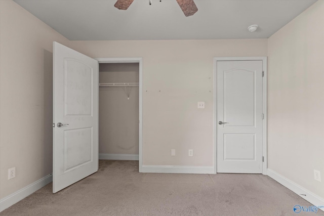 5008 Montauk Trl, Owens Cross Roads, AL 35763 - unfurnished bedroom featuring light carpet, baseboards, a closet, and a ceiling fan