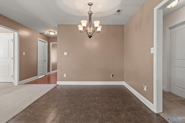 5008 Montauk Trl, Owens Cross Roads, AL 35763 - empty room featuring a chandelier and baseboards