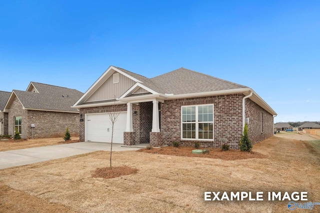 view of front facade featuring a garage, brick siding, driveway, and a shingled roof