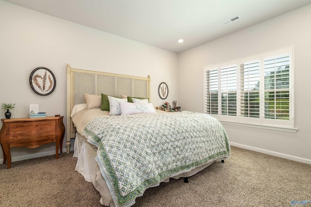 bedroom with recessed lighting, baseboards, visible vents, and carpet floors