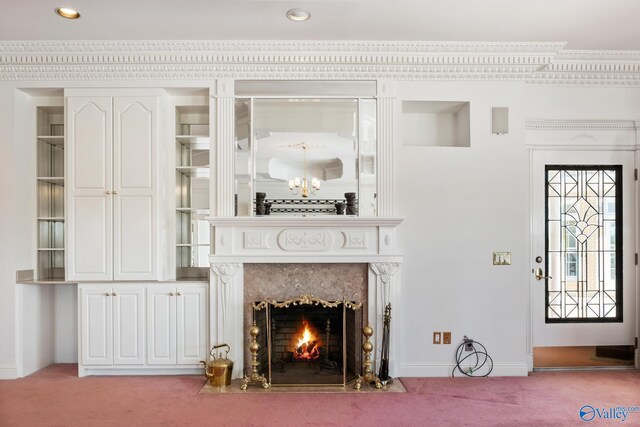 carpeted living room with a fireplace