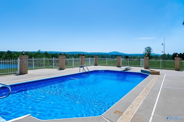 view of pool featuring a mountain view