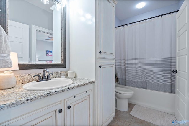 full bathroom featuring vanity, toilet, shower / bath combination with curtain, and tile patterned flooring