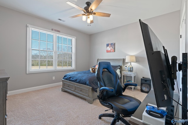 carpeted bedroom with ceiling fan