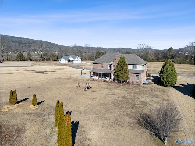 exterior space featuring a mountain view