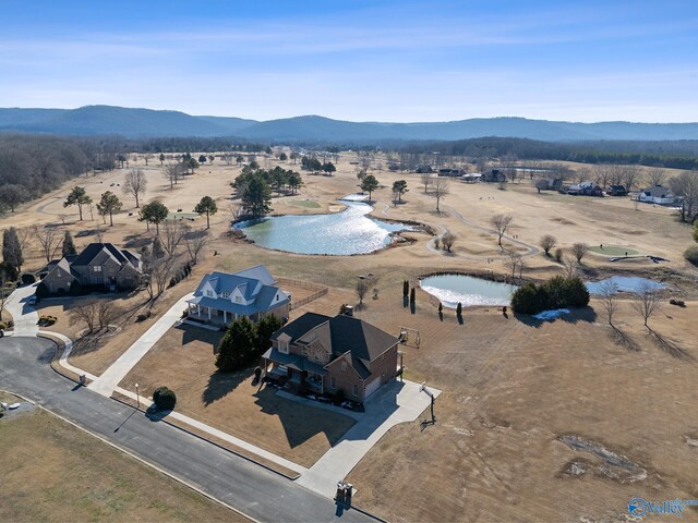 aerial view with a water and mountain view