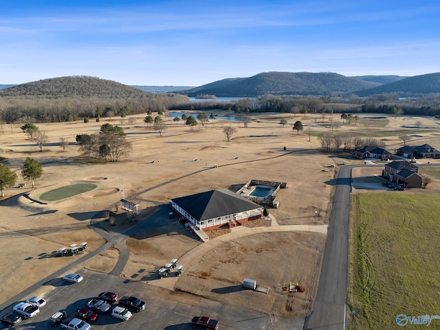 birds eye view of property with a mountain view