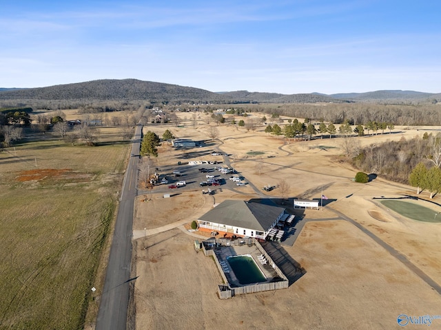 birds eye view of property featuring a mountain view