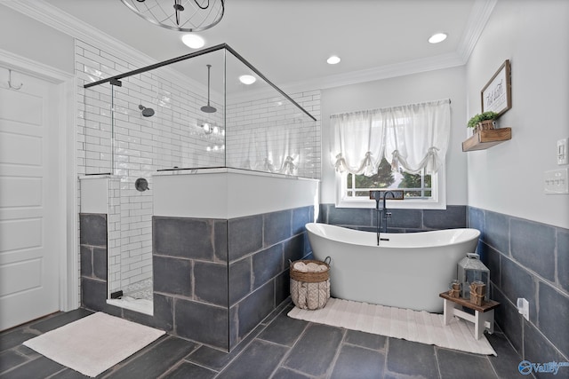 bathroom with crown molding, shower with separate bathtub, and tile walls