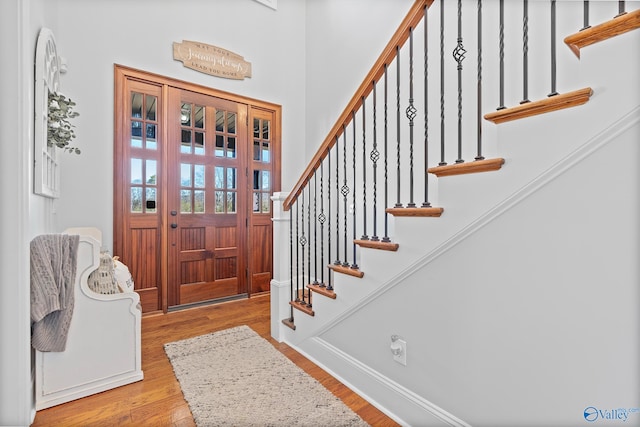 foyer with light wood-type flooring