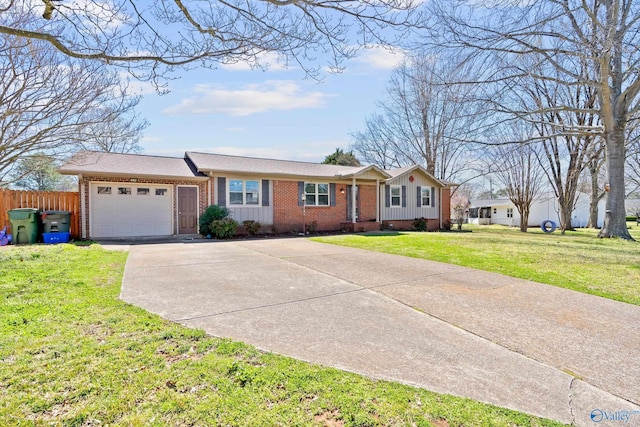 ranch-style house with a garage, driveway, fence, a front yard, and brick siding