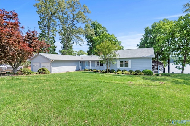 ranch-style house with an attached garage and a front yard