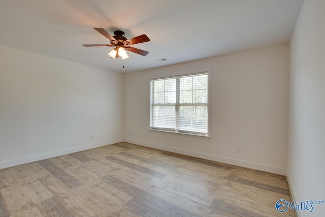 unfurnished room with ceiling fan and light hardwood / wood-style floors