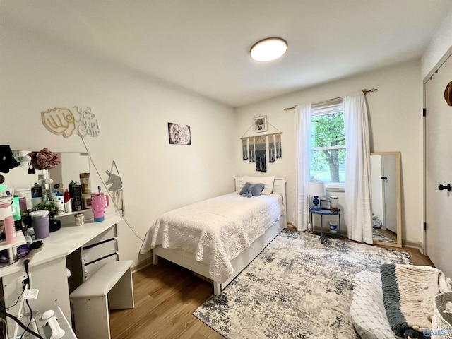 229 Crawford Rd, Scottsboro, AL 35769 - bedroom featuring light wood-type flooring and baseboards