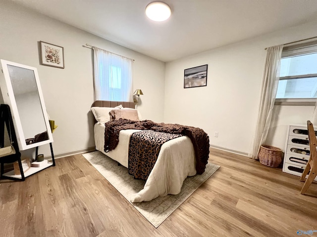 229 Crawford Rd, Scottsboro, AL 35769 - bedroom with baseboards and light wood-style floors