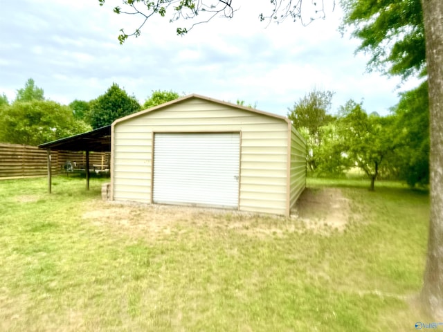 229 Crawford Rd, Scottsboro, AL 35769 - garage with fence and a detached garage