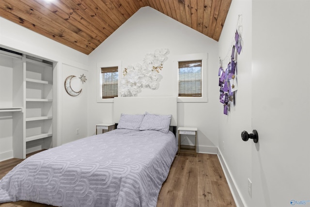 bedroom with wooden ceiling, wood-type flooring, and vaulted ceiling