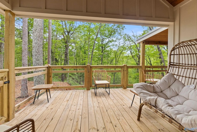 wooden terrace with outdoor lounge area