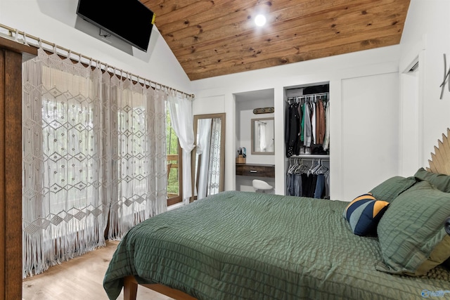 bedroom featuring hardwood / wood-style flooring, wooden ceiling, lofted ceiling, and a closet