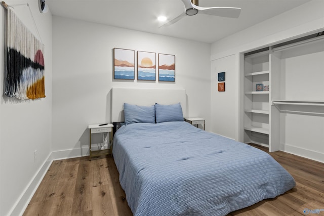 bedroom featuring hardwood / wood-style flooring and ceiling fan