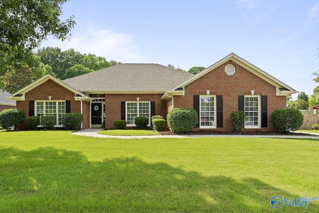 2624 Bransford Trl, Owens Cross Roads, AL 35763 - view of front of property featuring a front yard, brick siding, and roof with shingles