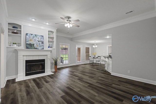 2624 Bransford Trl, Owens Cross Roads, AL 35763 - unfurnished living room featuring a fireplace, ceiling fan, baseboards, wood finished floors, and crown molding
