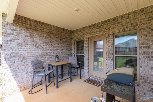 view of patio / terrace with grilling area and outdoor dining space