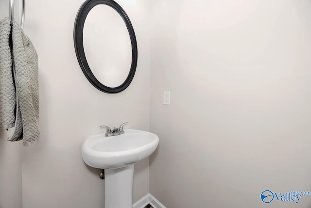 bathroom featuring baseboards