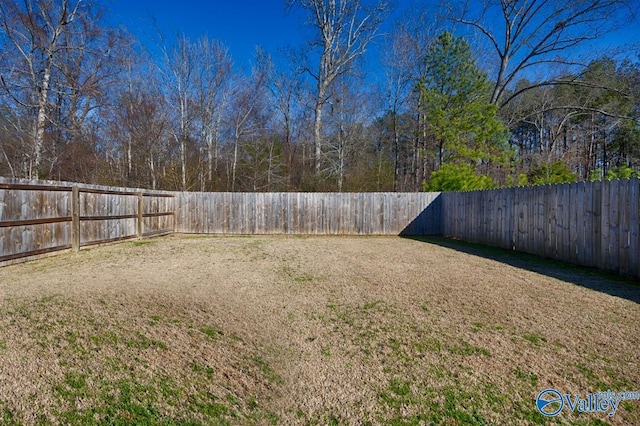 view of yard featuring a fenced backyard