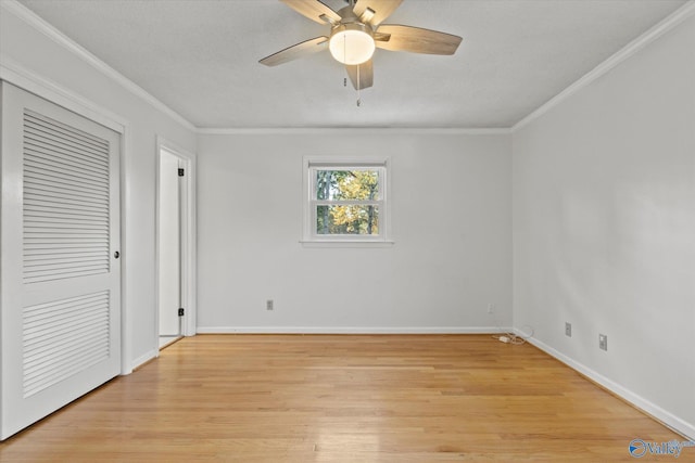 unfurnished bedroom with crown molding, ceiling fan, and light hardwood / wood-style floors