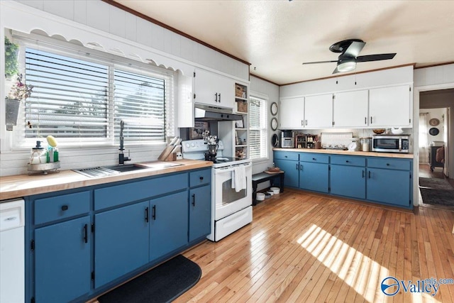 kitchen with white electric stove, blue cabinetry, and white cabinetry