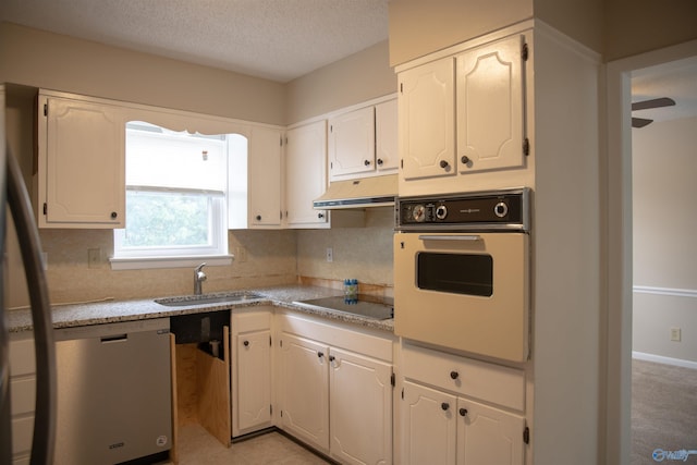 8206 SE Willowbrook Cir Unit B, Huntsville, AL 35802 - kitchen featuring white oven, dishwasher, black electric cooktop, under cabinet range hood, and backsplash