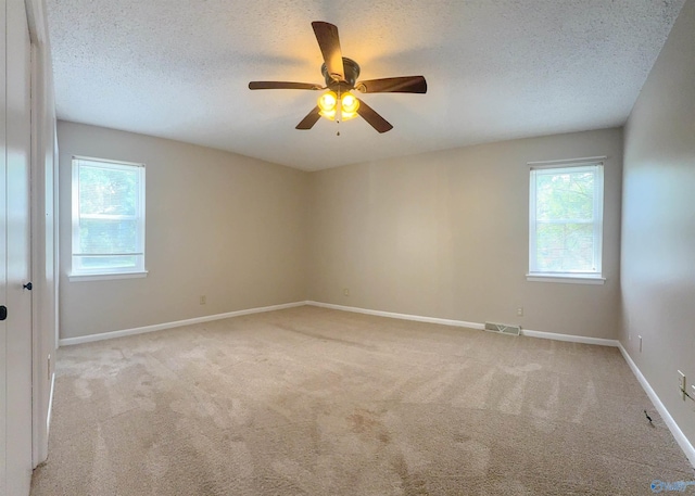 8206 SE Willowbrook Cir Unit B, Huntsville, AL 35802 - carpeted empty room featuring a textured ceiling and ceiling fan