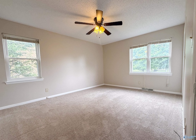 8206 SE Willowbrook Cir Unit B, Huntsville, AL 35802 - empty room featuring carpet, ceiling fan, and a textured ceiling