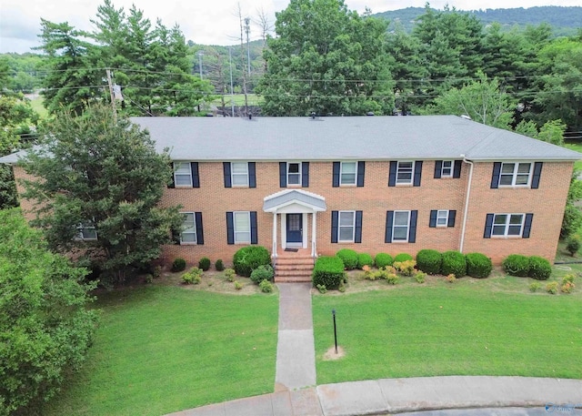 8206 SE Willowbrook Cir Unit B, Huntsville, AL 35802 - colonial home featuring a front yard and brick siding