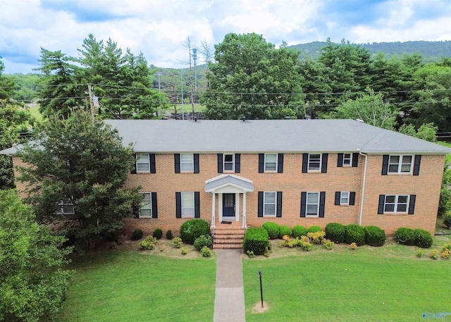 8206 SE Willowbrook Cir Unit B, Huntsville, AL 35802 - colonial inspired home with a front yard and brick siding
