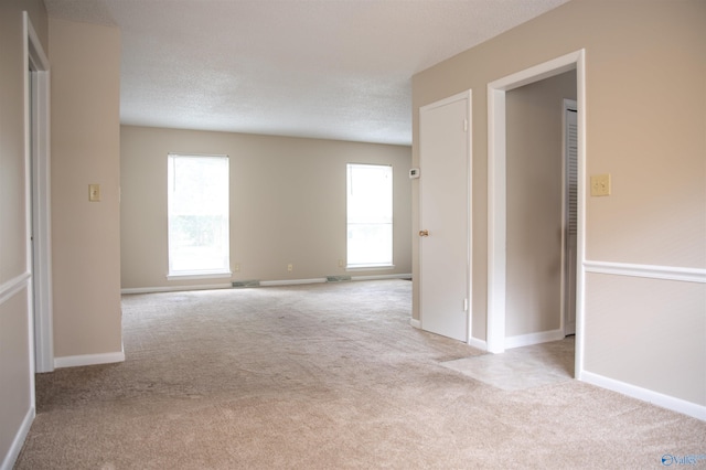 8206 SE Willowbrook Cir Unit B, Huntsville, AL 35802 - empty room with carpet floors and healthy amount of natural light