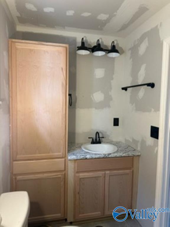 bathroom featuring toilet