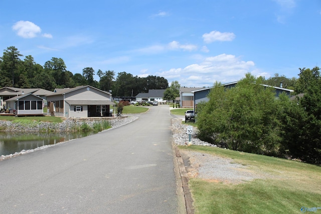 view of road featuring a water view