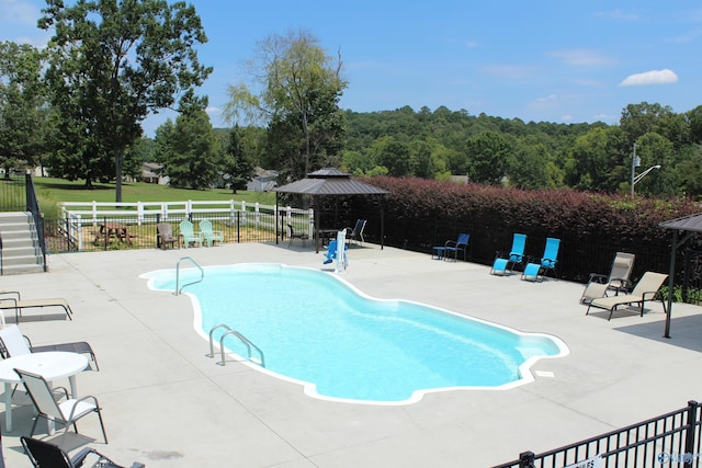 view of pool with a gazebo and a patio area