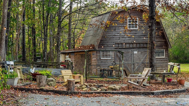 exterior space with an outbuilding