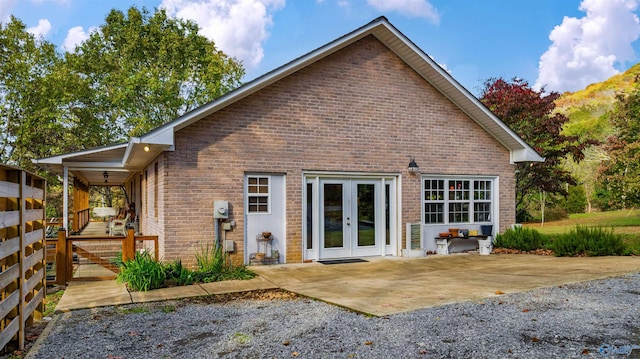 back of house featuring french doors