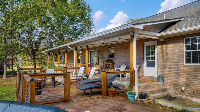 wooden deck with ceiling fan