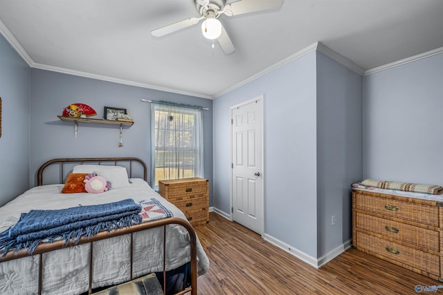 bedroom featuring ornamental molding, ceiling fan, and hardwood / wood-style flooring