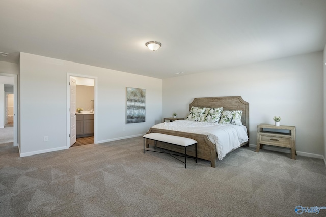 bedroom featuring light colored carpet