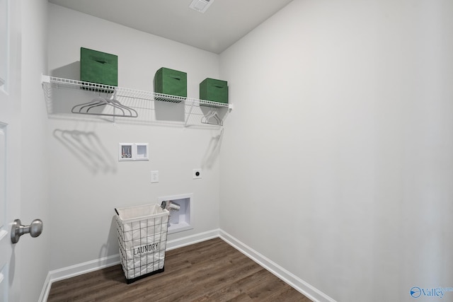 laundry area with dark hardwood / wood-style floors, washer hookup, and hookup for an electric dryer