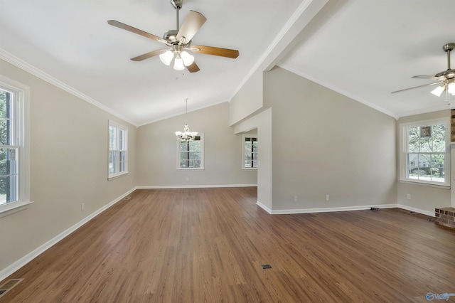 unfurnished living room with lofted ceiling, dark wood-type flooring, and ornamental molding