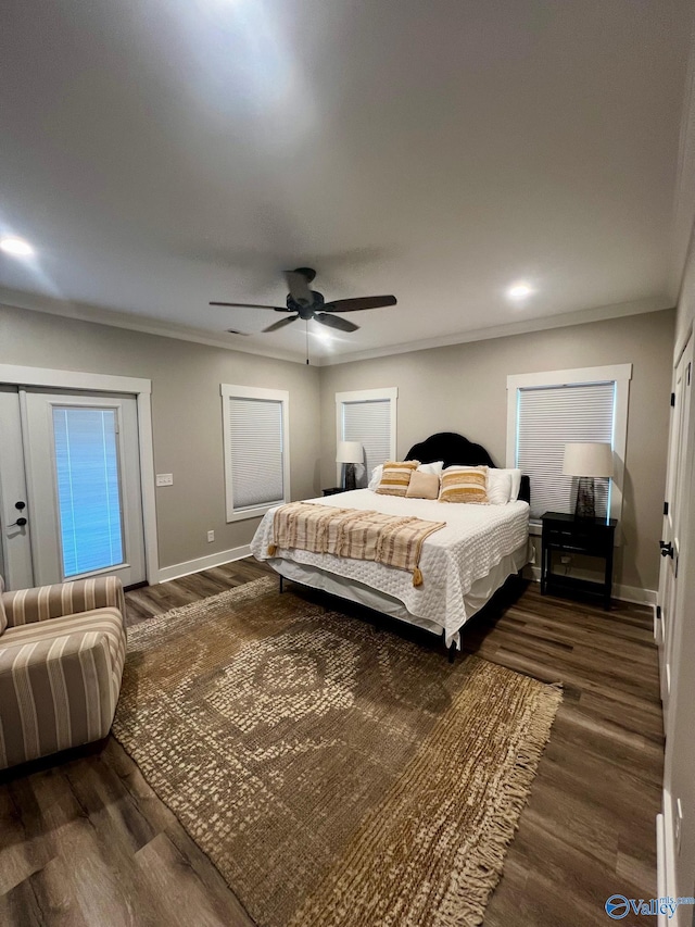 bedroom with ceiling fan and dark hardwood / wood-style flooring